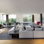 White modular sofas in a large living room