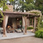 Gazebo with fireplace in country garden design