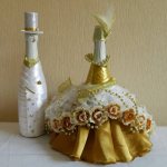 DIY bottle of champagne in an elegant bride&#39;s dress