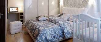 Floral pattern on a bedspread in a bedroom with a crib