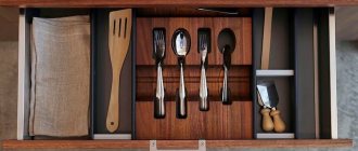 Photo of a drawer with compartments for forks and spoons