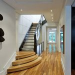 Hall with stairs in a spacious apartment