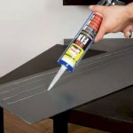 Glue for gluing a mirror to a wall