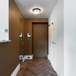 Brown wall decoration in a narrow corridor