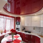 Red stretch ceiling in a modern kitchen