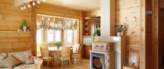 Kitchen-living room in a country house made of timber