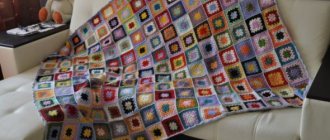 Unusual bedspread made of multi-colored squares