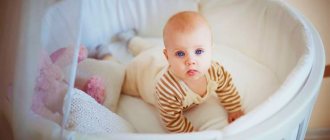 Newborn baby in a round crib