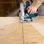 Cutting laminated chipboard without chipping