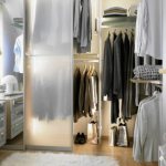 Sliding wardrobe with translucent doors and internal lighting