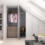 Wardrobe in the attic with hinged doors