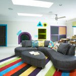 Stylish asymmetrical sofa for the playroom