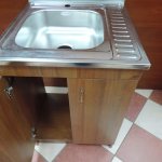 Traditional kitchen cabinet with countertop sink