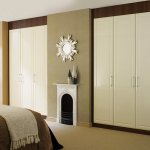 Built-in wardrobes with hinged doors in the bedroom