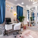 Mirrored wardrobe in a teenage girl&#39;s room